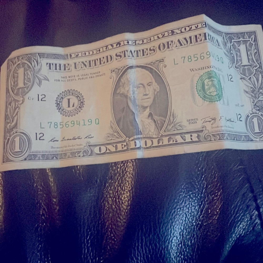 1 dollar bill but it is one of the special ones